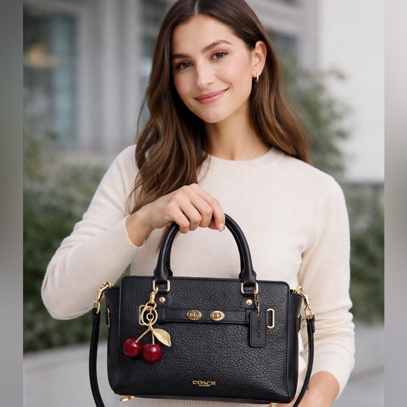 Coach Handbags - COACH soho Black Leather Carryall crossbody bag Satchel with Red Cherry Charm